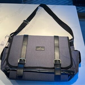 NWT London fog denim canvas messenger bag.   Lots of pockets! Adjustable strap.